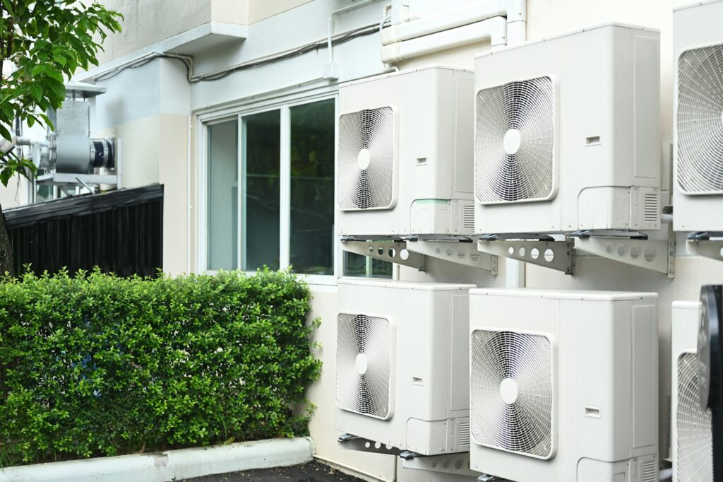 Air conditioning unit or compressor installed outside a building