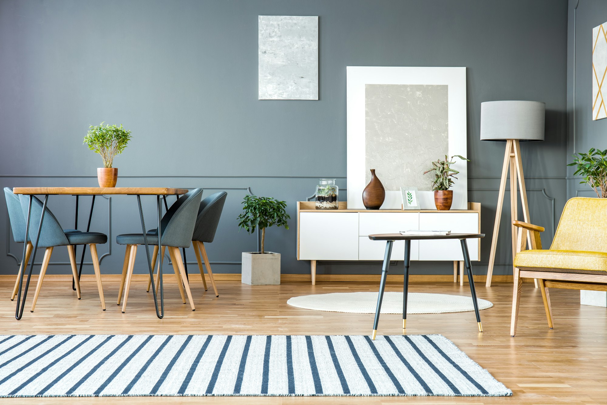 Grey apartment interior with paintings